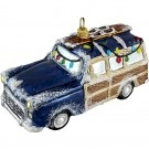 Woody car with skis on top.